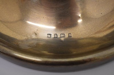 Lot 85 - George V silver-mounted capstan pocket watch inkwell with castellated edge