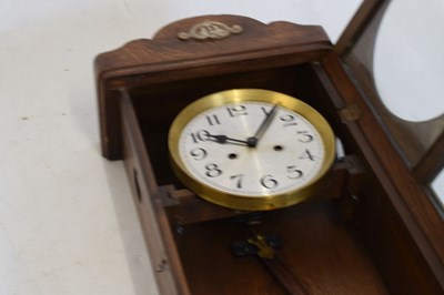 Lot 484 - 1920s oak wall clock
