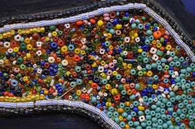 Lot 774 - Chief Jimoh Buraimoh (Nigerian, b. 1943) - Figural abstract beadwork on panel