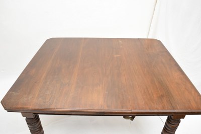 Lot 799 - Edwardian walnut 'Selbat' trademark extending dining table