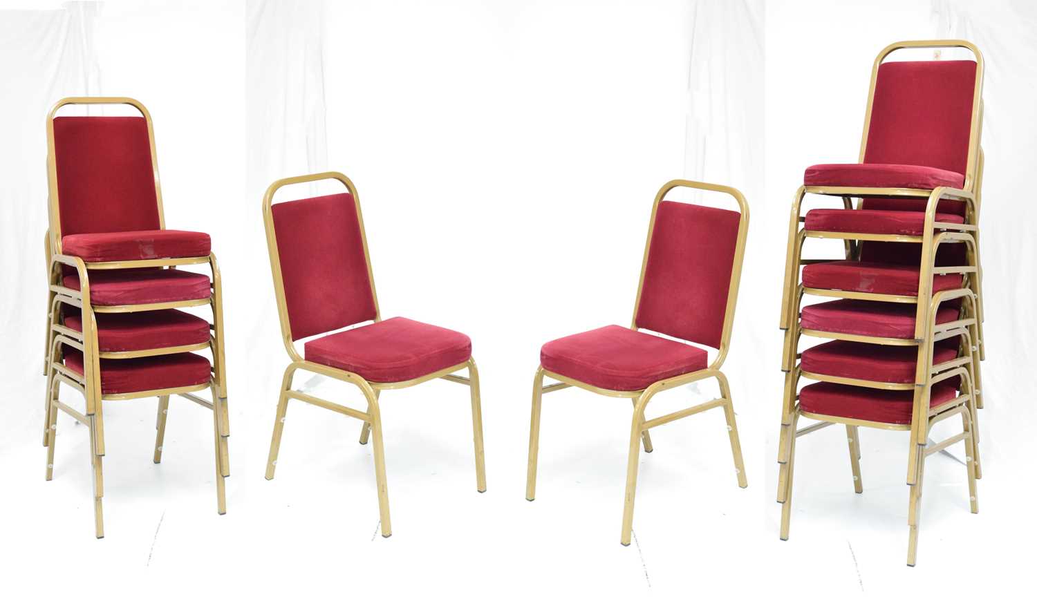 Lot 798 - Set of twelve gold finish stacking function