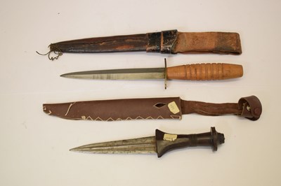 Lot 481 - Double edged African dagger and 'commando'-type dagger