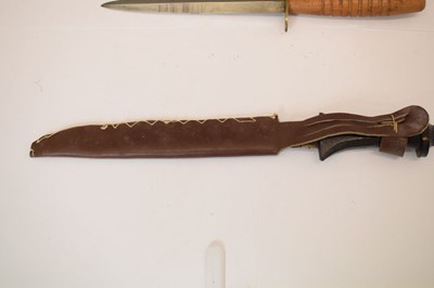 Lot 481 - Double edged African dagger and 'commando'-type dagger