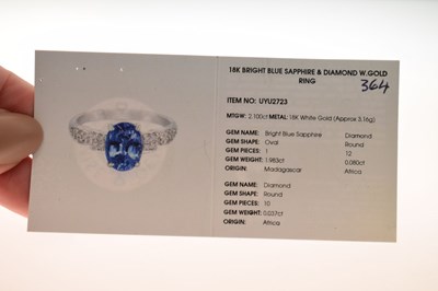 Lot 41 - 18ct white gold, oval sapphire and diamond ring