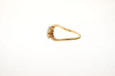 Lot 7 - Four-stone diamond 18ct gold crossover ring