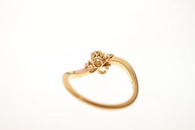 Lot 7 - Four-stone diamond 18ct gold crossover ring