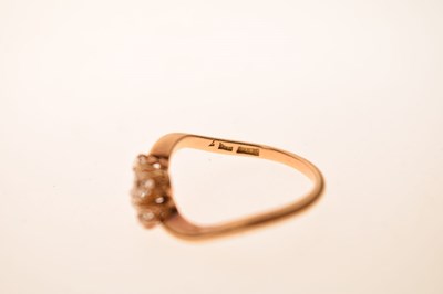 Lot 7 - Four-stone diamond 18ct gold crossover ring