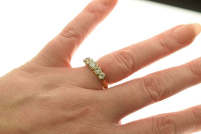 Lot 10 - Diamond 18ct yellow gold five stone ring