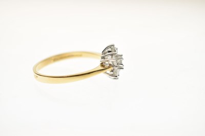 Lot 13 - Diamond flower head 18ct yellow and white gold set cluster ring
