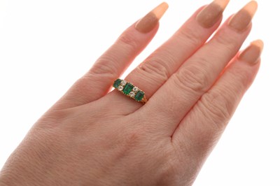 Lot 25 - Edwardian emerald and diamond 18ct yellow gold ring