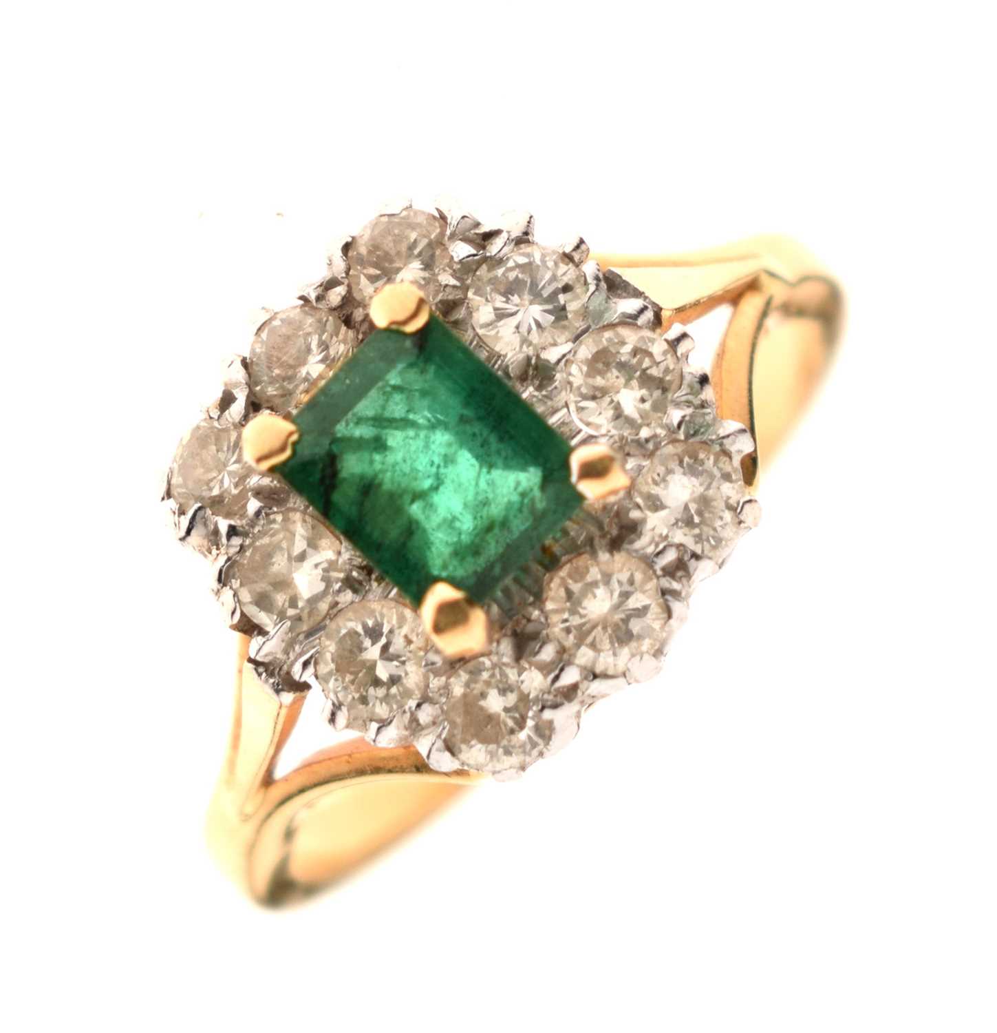 Lot 19 - Unmarked yellow metal, emerald and diamond cluster ring