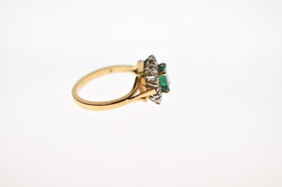 Lot 19 - Unmarked yellow metal, emerald and diamond cluster ring