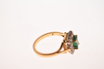 Lot 19 - Unmarked yellow metal, emerald and diamond cluster ring