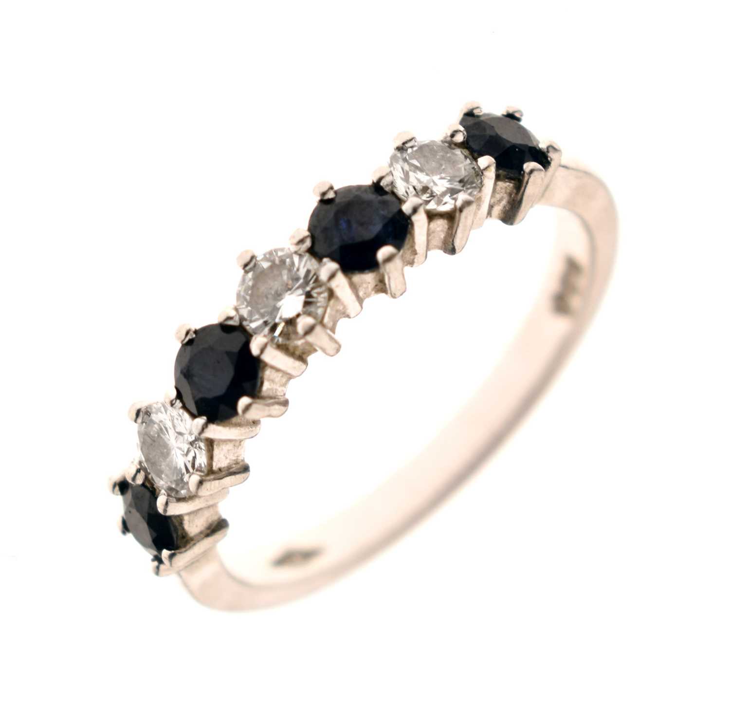 Lot 16 - Diamond and sapphire platinum seven stone half eternity ring