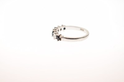 Lot 16 - Diamond and sapphire platinum seven stone half eternity ring