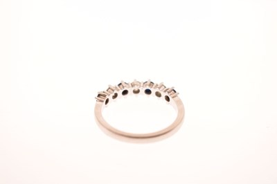 Lot 16 - Diamond and sapphire platinum seven stone half eternity ring