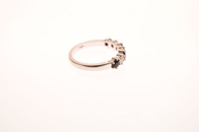 Lot 16 - Diamond and sapphire platinum seven stone half eternity ring