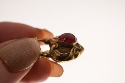 Lot 48 - Victorian unmarked gold engraved mariner link bracelet with garnet carbuncle heart locket