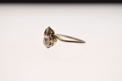 Lot 4 - Diamond 18ct white gold and platinum set two stone diamond ring of crossover design