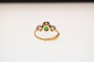 Lot 26 - Green tourmaline and diamond 18ct gold and platinum set three-stone ring