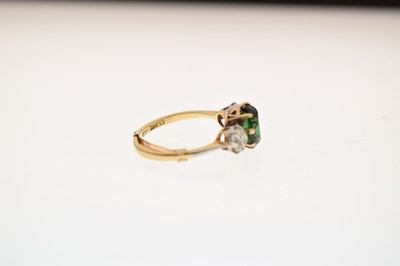 Lot 26 - Green tourmaline and diamond 18ct gold and platinum set three-stone ring