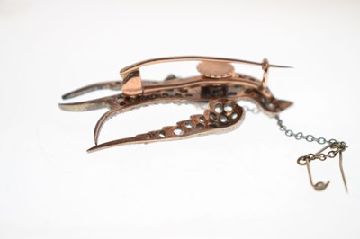 Lot 34 - Victorian diamond and ruby swallow brooch