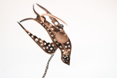 Lot 34 - Victorian diamond and ruby swallow brooch