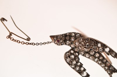 Lot 34 - Victorian diamond and ruby swallow brooch