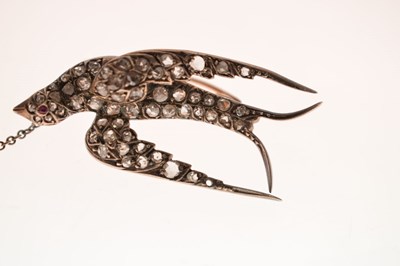 Lot 34 - Victorian diamond and ruby swallow brooch