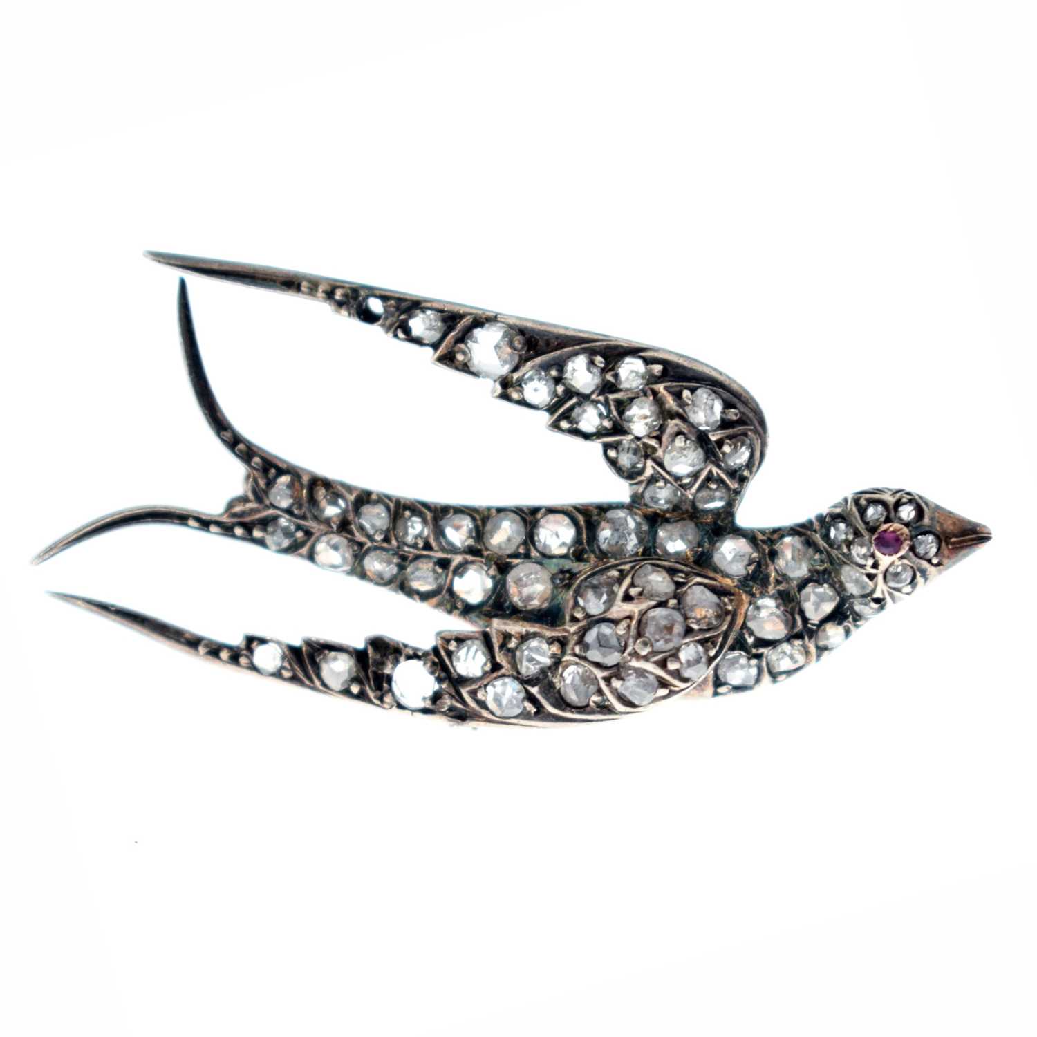Lot 34 - Victorian diamond and ruby swallow brooch