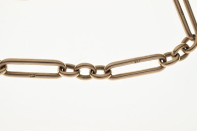 Lot 152 - Late Victorian or Edwardian yellow metal (9C) 'rose gold' trombone link Albert chain, 36.4g