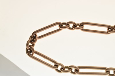 Lot 152 - Late Victorian or Edwardian yellow metal (9C) 'rose gold' trombone link Albert chain, 36.4g