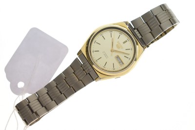 Lot 219 - Seiko - 5 two-tone bracelet watch
