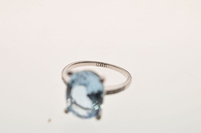 Lot 16 - Blue topaz and diamond white metal ring