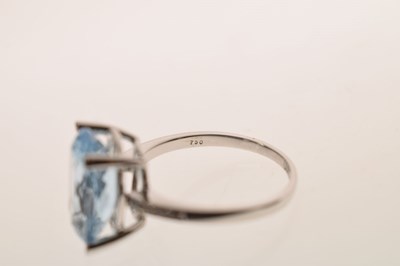 Lot 16 - Blue topaz and diamond white metal ring