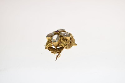 Lot 27 - Early Victorian ruby and rock crystal yellow metal brooch