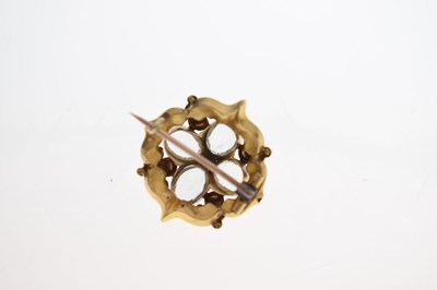 Lot 27 - Early Victorian ruby and rock crystal yellow metal brooch