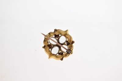 Lot 27 - Early Victorian ruby and rock crystal yellow metal brooch