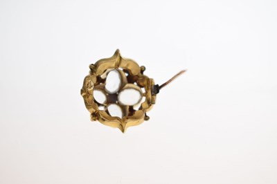 Lot 27 - Early Victorian ruby and rock crystal yellow metal brooch