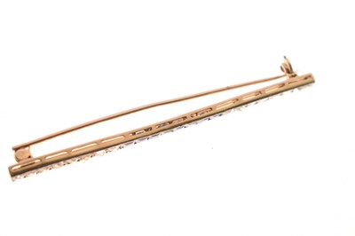 Lot 24 - Art Deco diamond and sapphire bar brooch