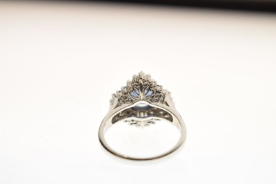 Lot 11 - Sapphire and diamond platinum cluster ring