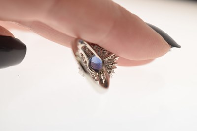 Lot 11 - Sapphire and diamond platinum cluster ring