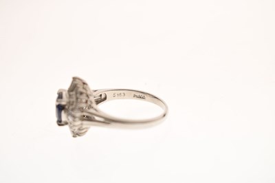 Lot 11 - Sapphire and diamond platinum cluster ring