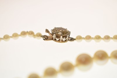 Lot 42 - Pearl necklace with yellow diamond clasp