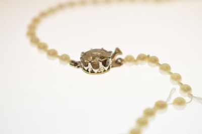 Lot 42 - Pearl necklace with yellow diamond clasp