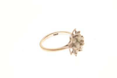 Lot 8 - Diamond white metal cluster ring stamped 18ct