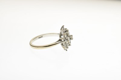 Lot 8 - Diamond white metal cluster ring stamped 18ct