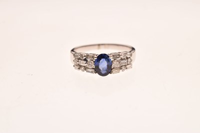 Lot 9 - Sapphire and diamond white metal ring