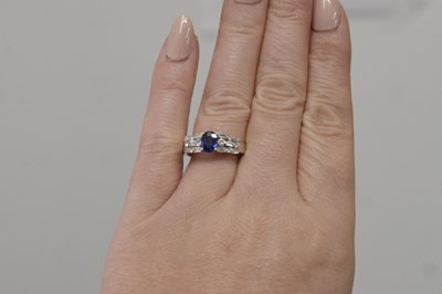 Lot 9 - Sapphire and diamond white metal ring