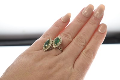 Lot 4 - Emerald and diamond double marquise white metal cluster ring